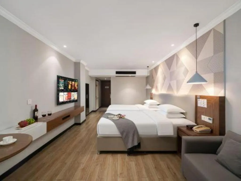 Bed in Borrman Hotel Chongqing Hechuan High-speed Railway Station District Government