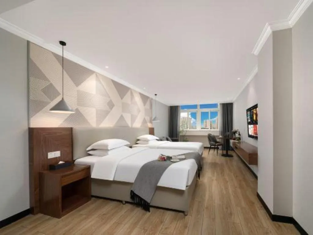 Bed in Borrman Hotel Chongqing Hechuan High-speed Railway Station District Government