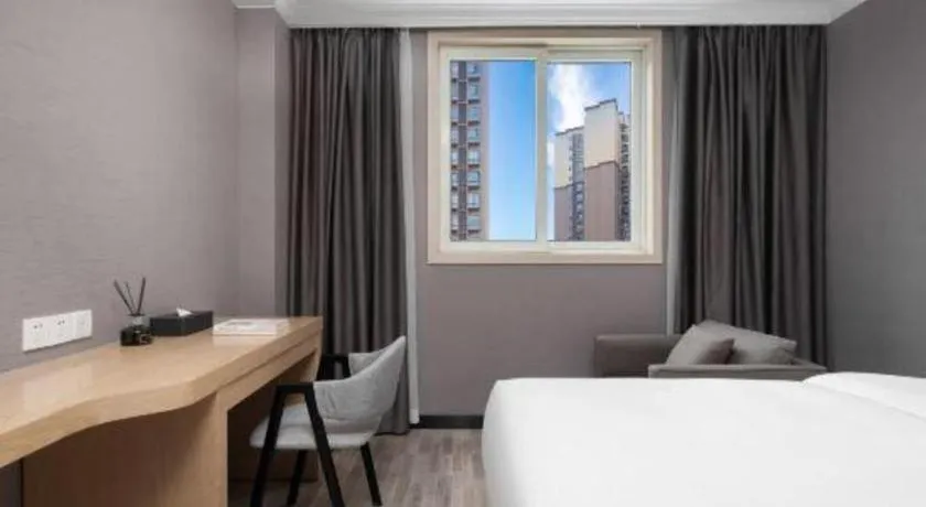 Bed in Borrman Hotel Chongqing Hechuan High-speed Railway Station District Government