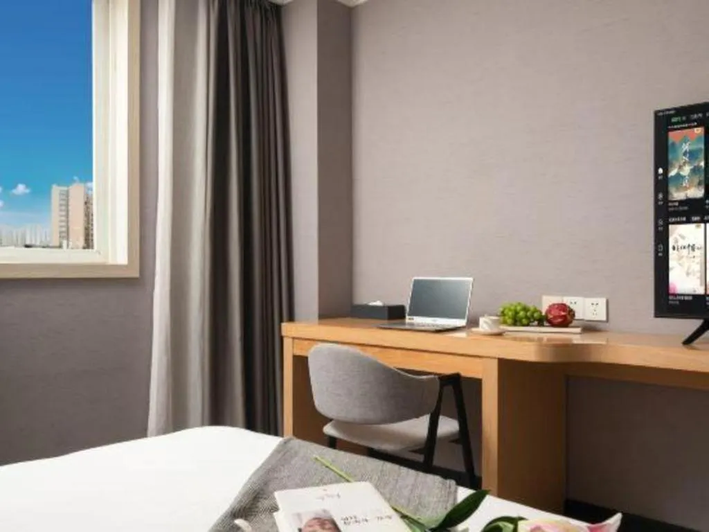 Bed in Borrman Hotel Chongqing Hechuan High-speed Railway Station District Government