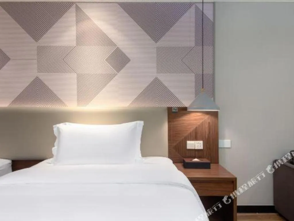 Bed in Borrman Hotel Chongqing Hechuan High-speed Railway Station District Government