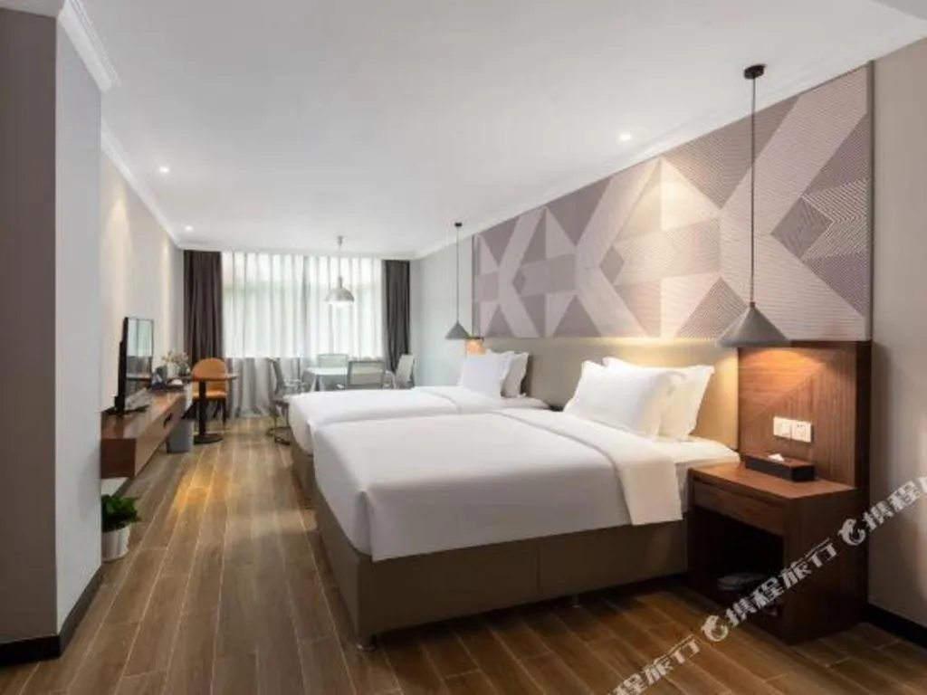 Bed in Borrman Hotel Chongqing Hechuan High-speed Railway Station District Government