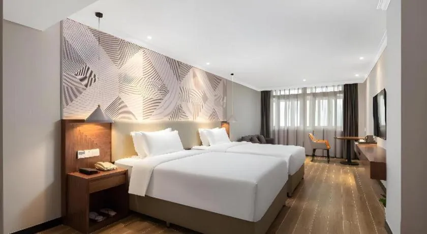 Bed in Borrman Hotel Chongqing Hechuan High-speed Railway Station District Government