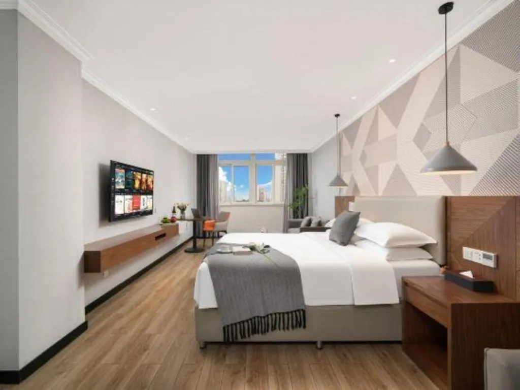 Bed in Borrman Hotel Chongqing Hechuan High-speed Railway Station District Government