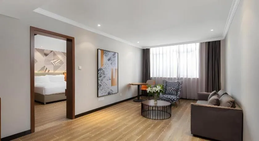 Bed in Borrman Hotel Chongqing Hechuan High-speed Railway Station District Government