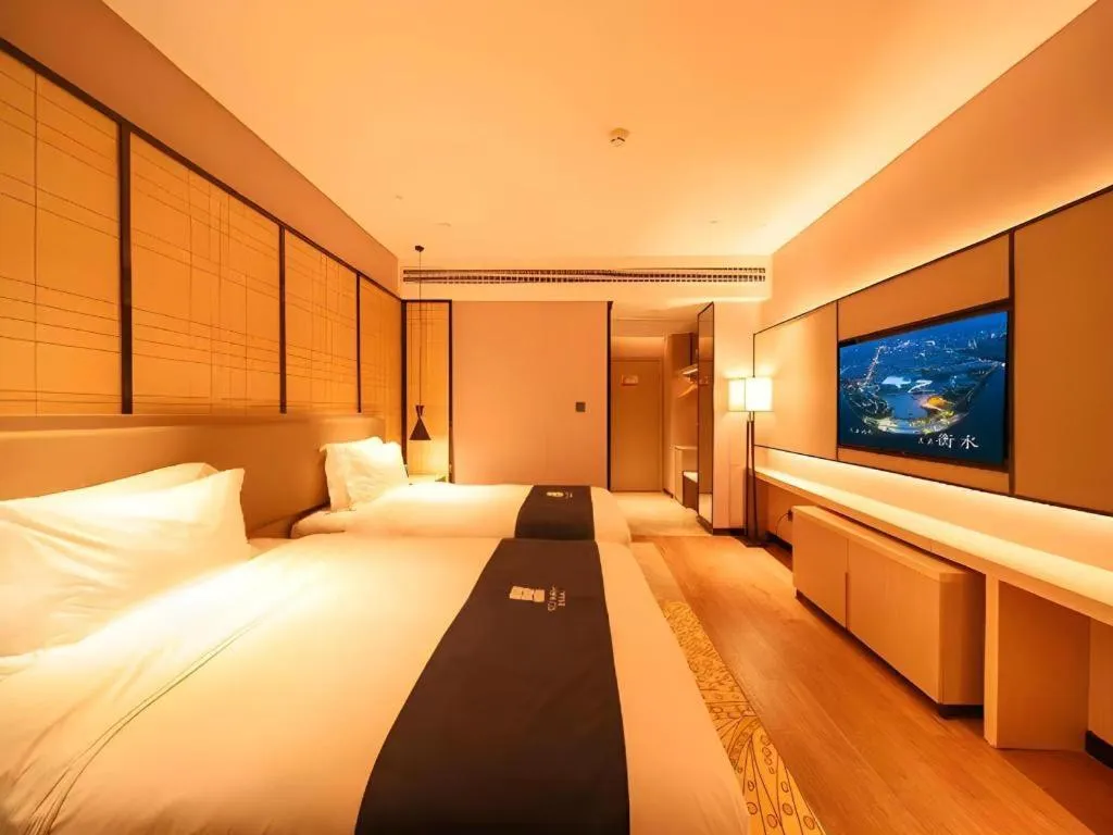 Bed in Echarm Hotel Hengshui 2nd High School High-speed Railway Station