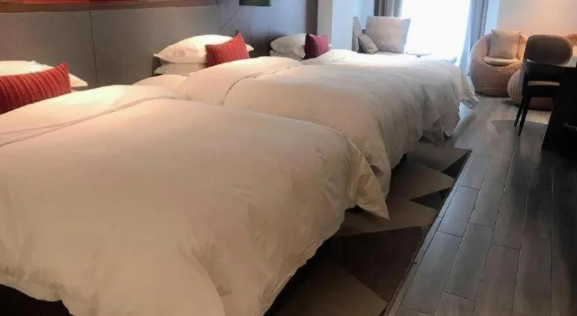 Bed in Borrman Hotel Guilin North Railway Station Zhonghao International
