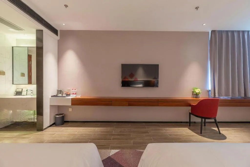 Bed in Borrman Hotel Guilin North Railway Station Zhonghao International