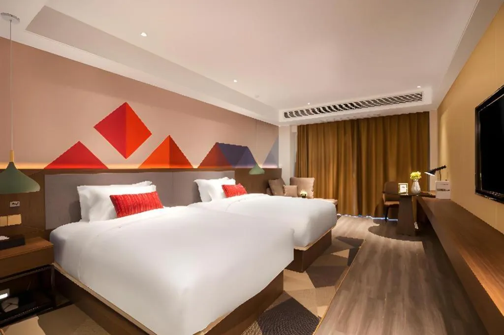 Bed in Borrman Hotel Guilin North Railway Station Zhonghao International