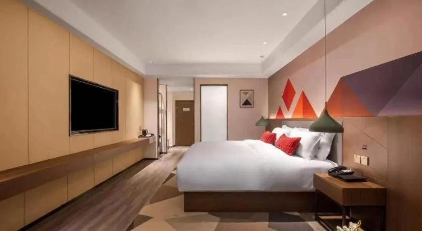 Bed in Borrman Hotel Guilin North Railway Station Zhonghao International