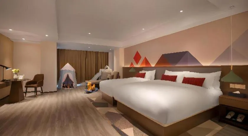 Bed in Borrman Hotel Guilin North Railway Station Zhonghao International