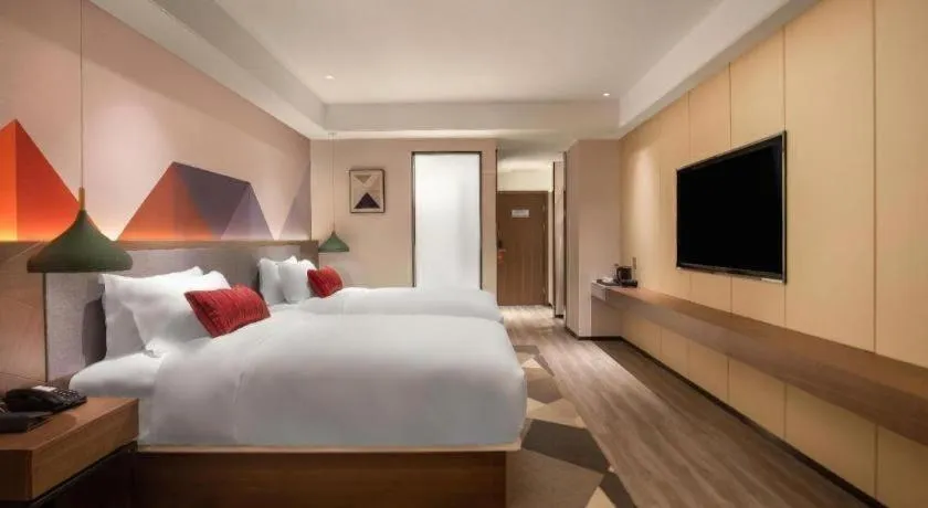 Bed in Borrman Hotel Guilin North Railway Station Zhonghao International