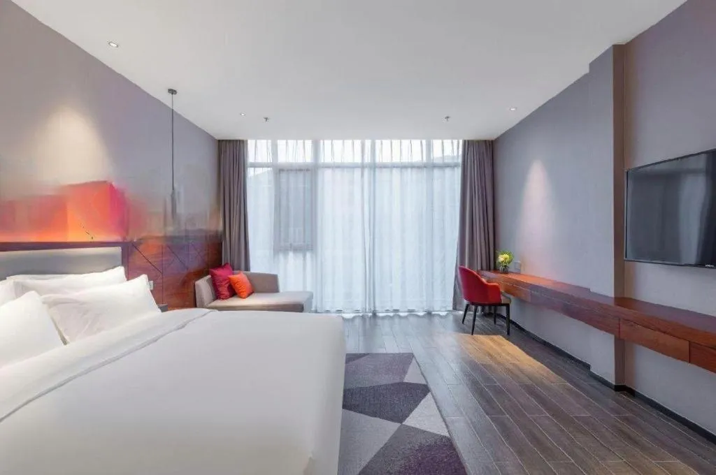 Bed in Borrman Hotel Guilin North Railway Station Zhonghao International