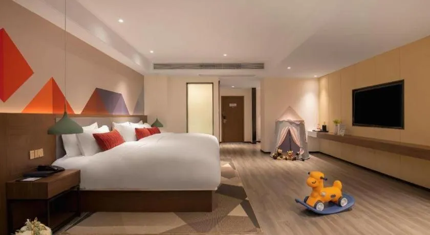 Bed in Borrman Hotel Guilin North Railway Station Zhonghao International