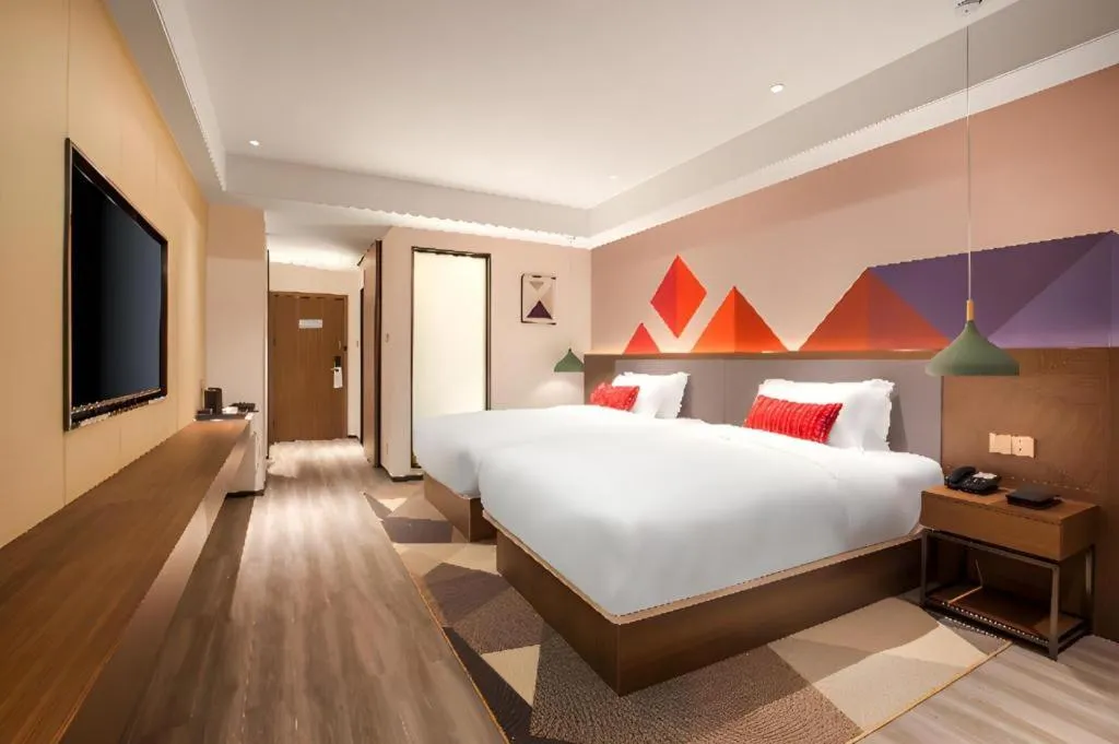 Bed in Borrman Hotel Guilin North Railway Station Zhonghao International