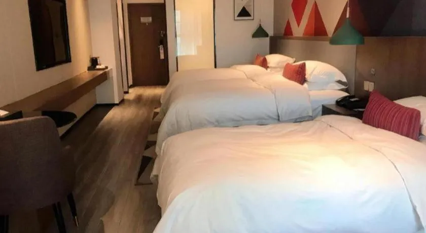 Bed in Borrman Hotel Guilin North Railway Station Zhonghao International