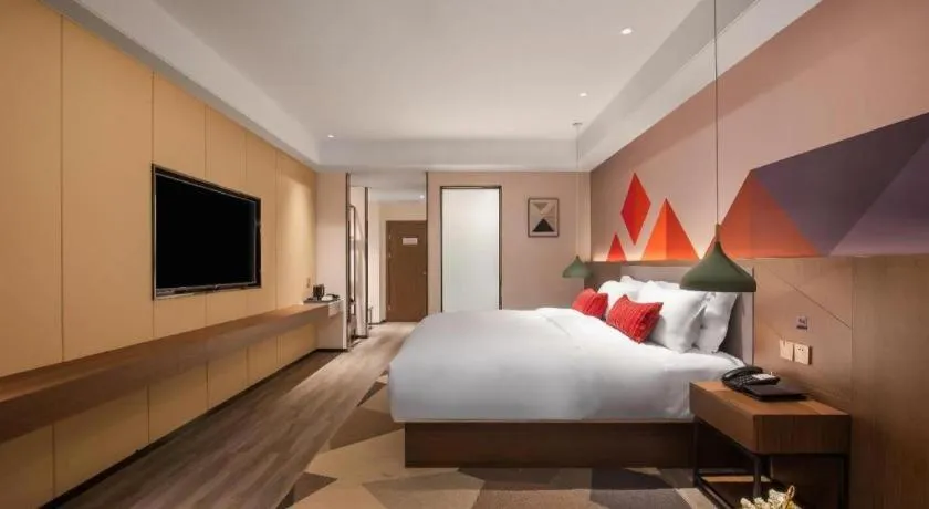 Bed in Borrman Hotel Guilin North Railway Station Zhonghao International