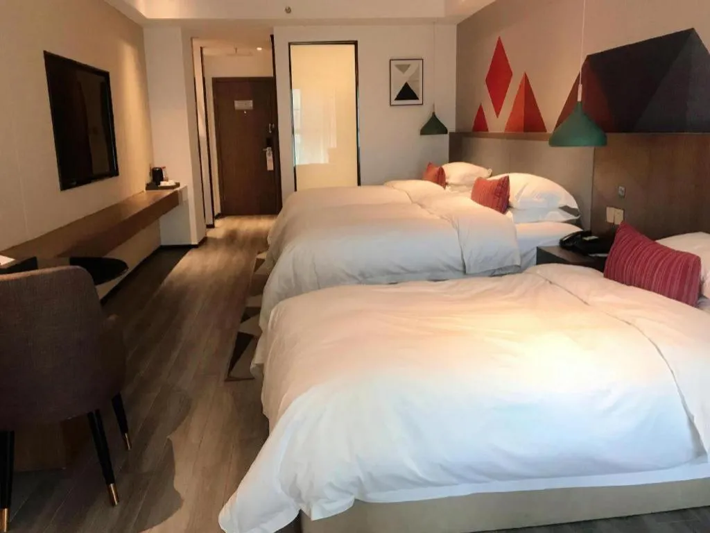 Bed in Borrman Hotel Guilin North Railway Station Zhonghao International