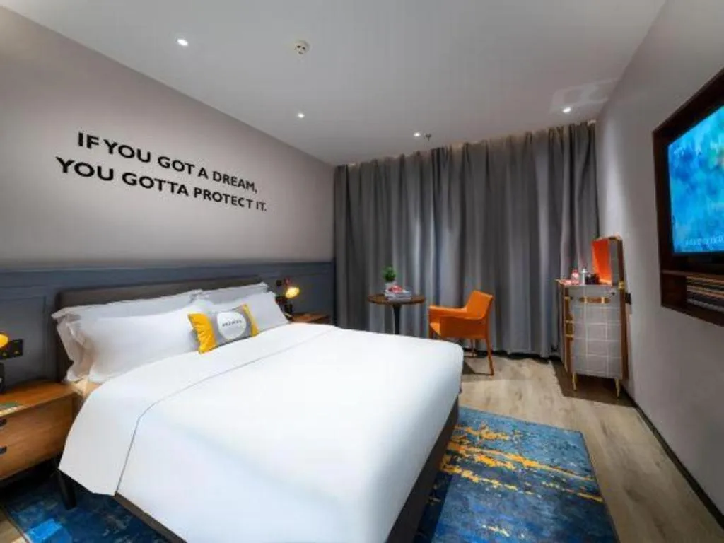 Bed in Premier City Comfort Hotel Suizhou Wuyue Plaza