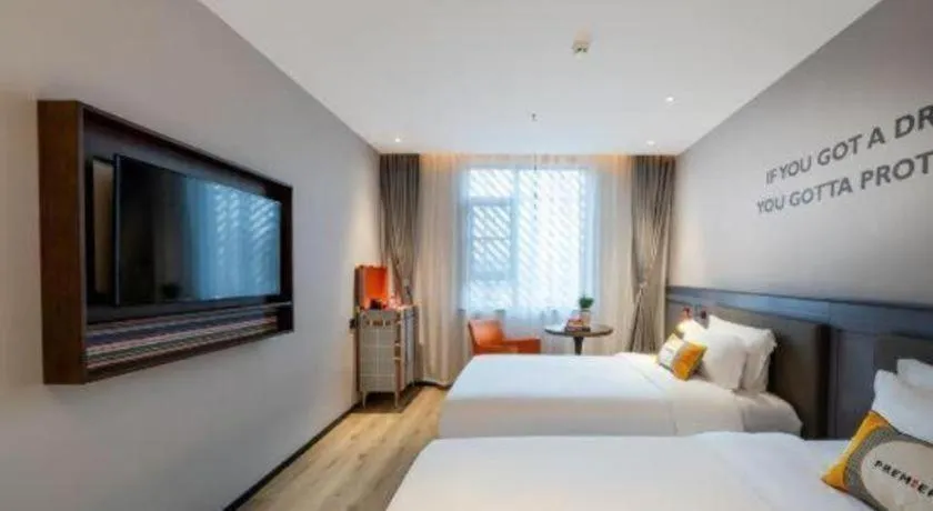 Bed in Premier City Comfort Hotel Suizhou Wuyue Plaza