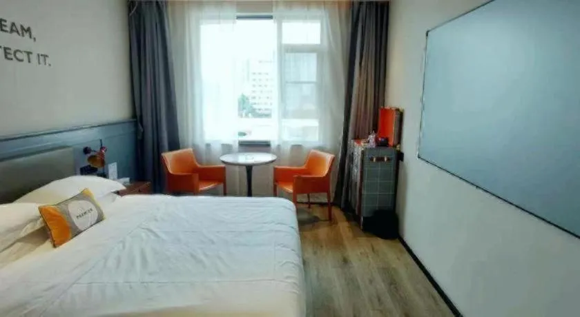 Bed in Premier City Comfort Hotel Suizhou Wuyue Plaza