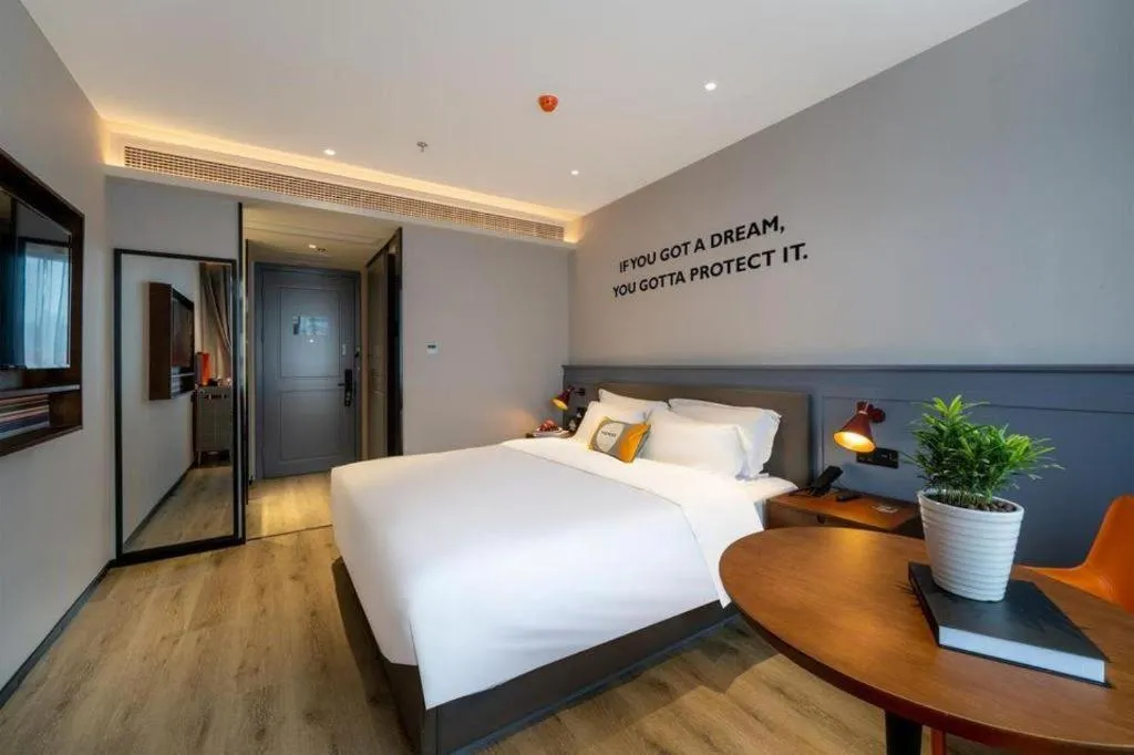 Bed in Premier City Comfort Hotel Suizhou Wuyue Plaza