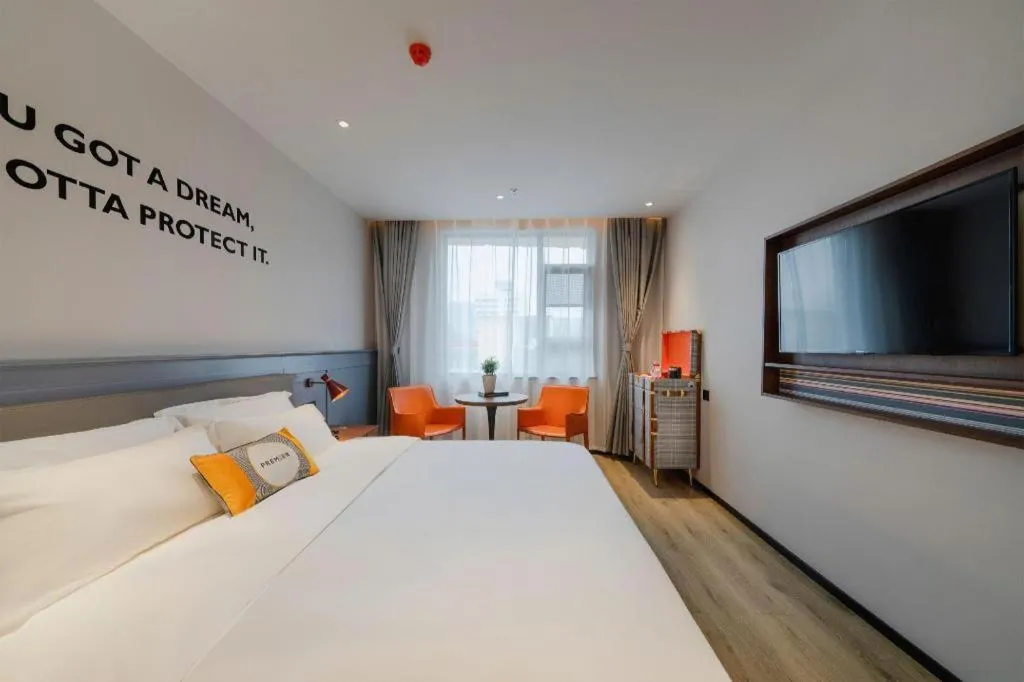 Bed in Premier City Comfort Hotel Suizhou Wuyue Plaza