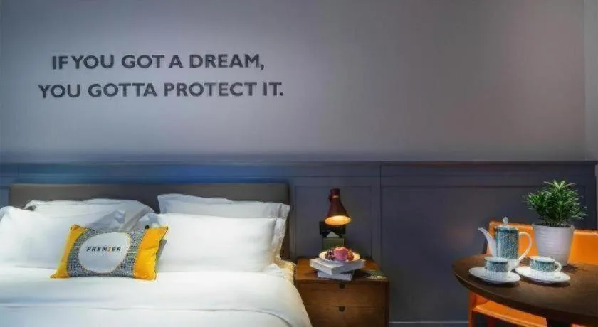 Bed in Premier City Comfort Hotel Suizhou Wuyue Plaza