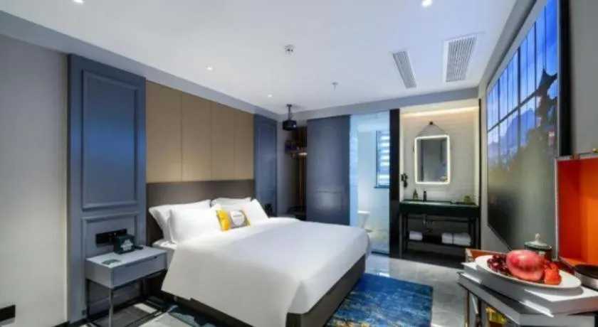 Bed in Premier City Comfort Hotel Suizhou Wuyue Plaza