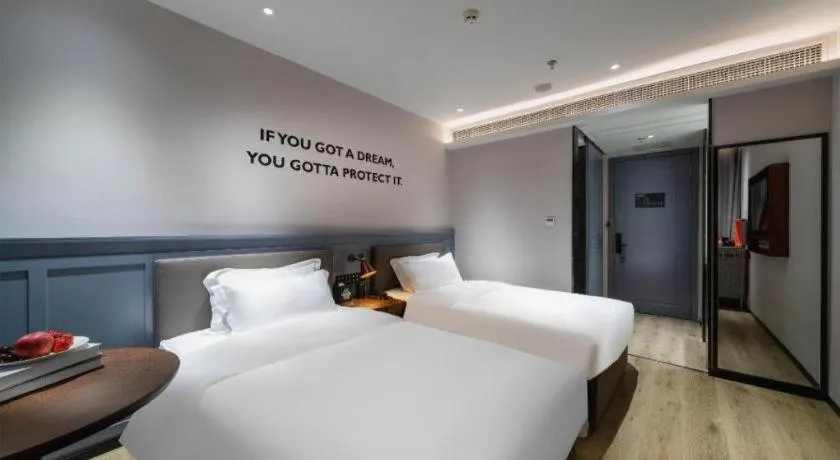 Bed in Premier City Comfort Hotel Suizhou Wuyue Plaza