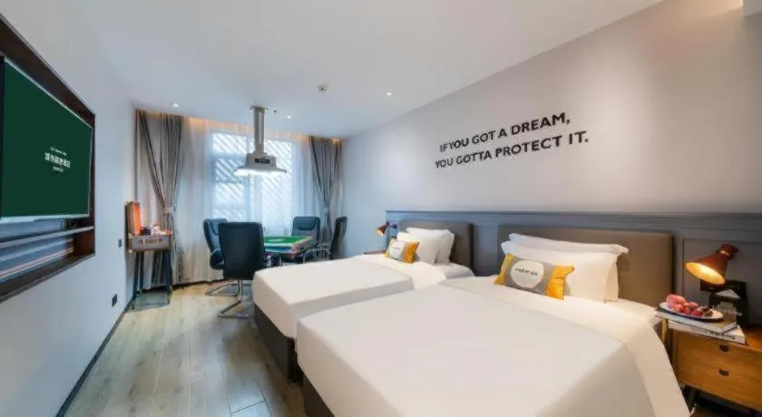 Bed in Premier City Comfort Hotel Suizhou Wuyue Plaza