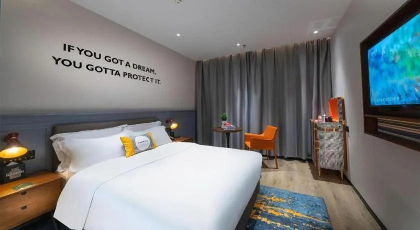 Bed in Premier City Comfort Hotel Suizhou Wuyue Plaza