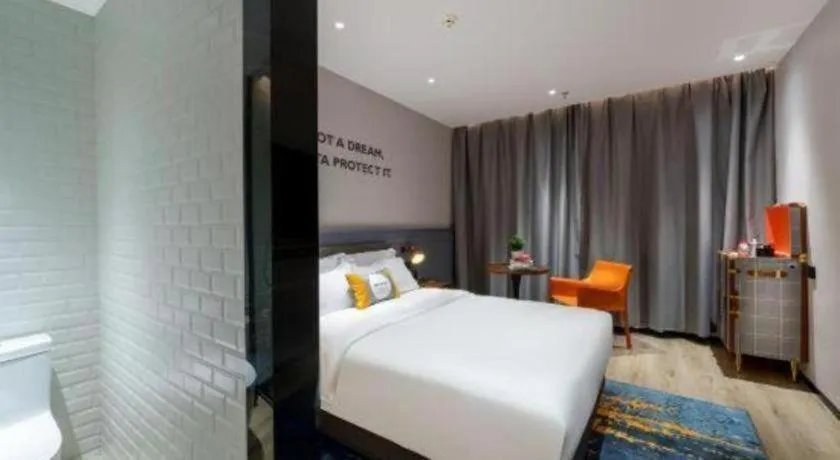 Bed in Premier City Comfort Hotel Suizhou Wuyue Plaza