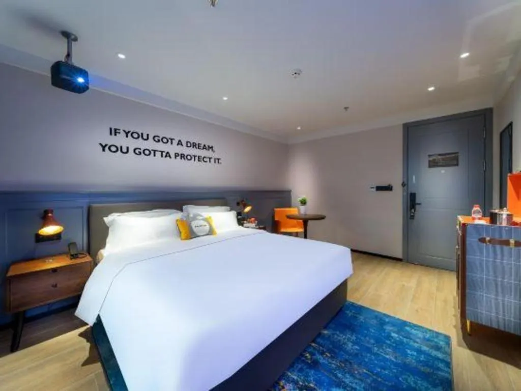 Bed in Premier City Comfort Hotel Suizhou Wuyue Plaza