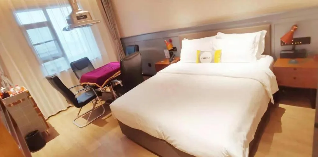 Bed in Premier City Comfort Hotel Suizhou Wuyue Plaza