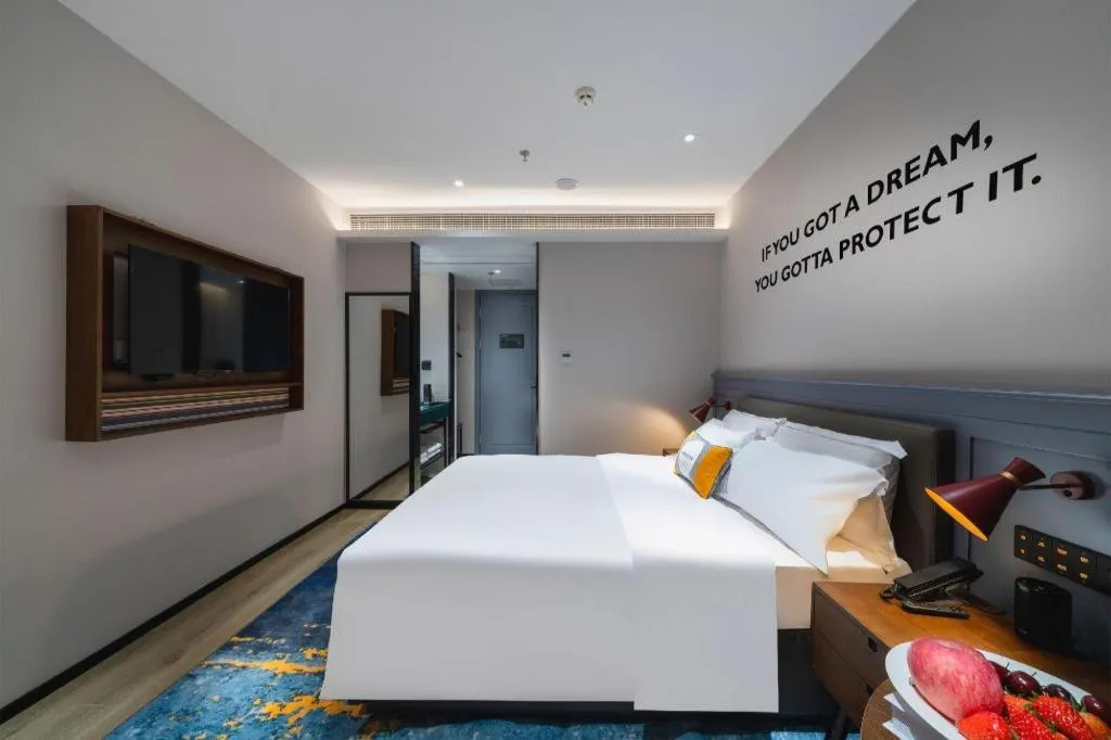Bed in Premier City Comfort Hotel Suizhou Wuyue Plaza