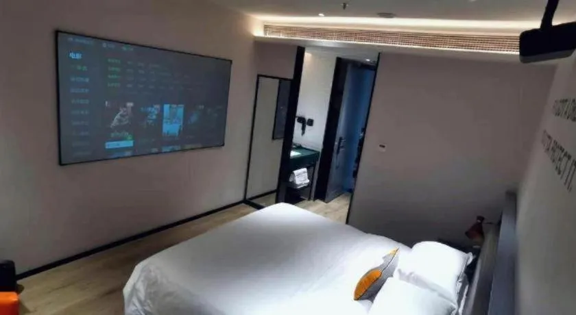 Bed in Premier City Comfort Hotel Suizhou Wuyue Plaza