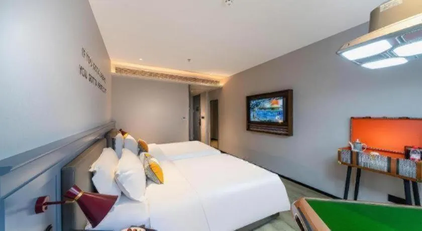 Bed in Premier City Comfort Hotel Suizhou Wuyue Plaza