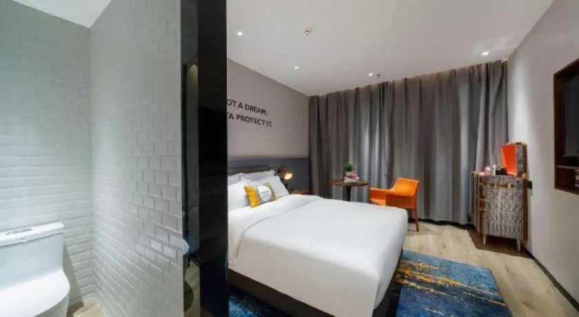 Bed in Premier City Comfort Hotel Suizhou Wuyue Plaza