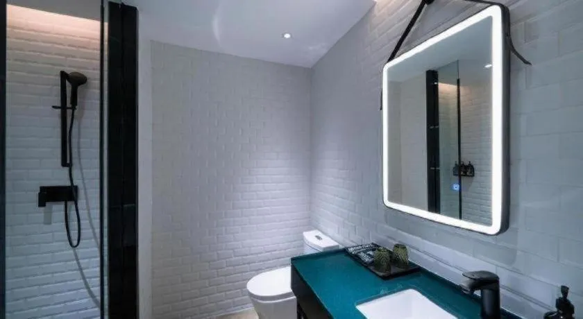 Bed in Premier City Comfort Hotel Suizhou Wuyue Plaza