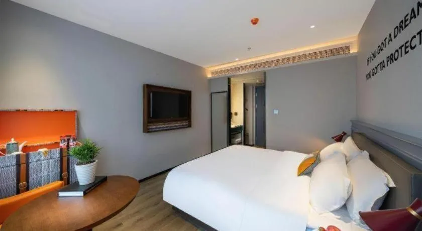 Bed in Premier City Comfort Hotel Suizhou Wuyue Plaza