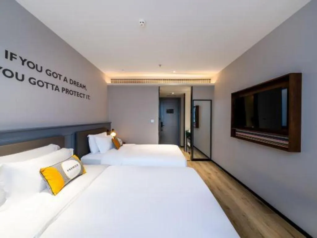 Bed in Premier City Comfort Hotel Suizhou Wuyue Plaza