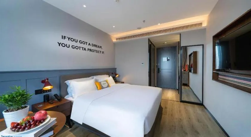 Bed in Premier City Comfort Hotel Suizhou Wuyue Plaza