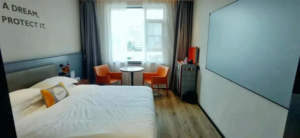 Bed in Premier City Comfort Hotel Suizhou Wuyue Plaza