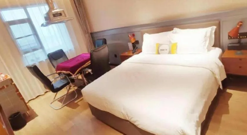 Bed in Premier City Comfort Hotel Suizhou Wuyue Plaza