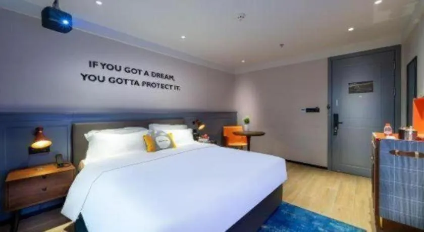 Bed in Premier City Comfort Hotel Suizhou Wuyue Plaza