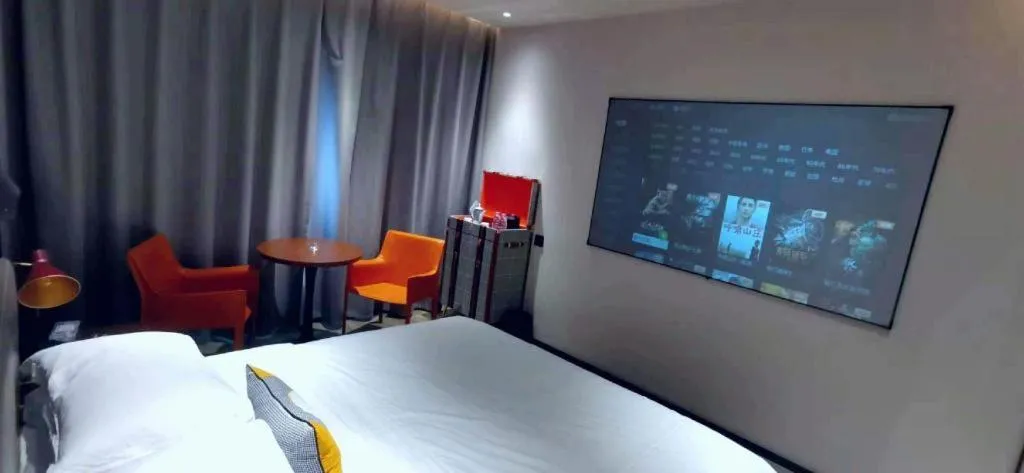 Bed in Premier City Comfort Hotel Suizhou Wuyue Plaza