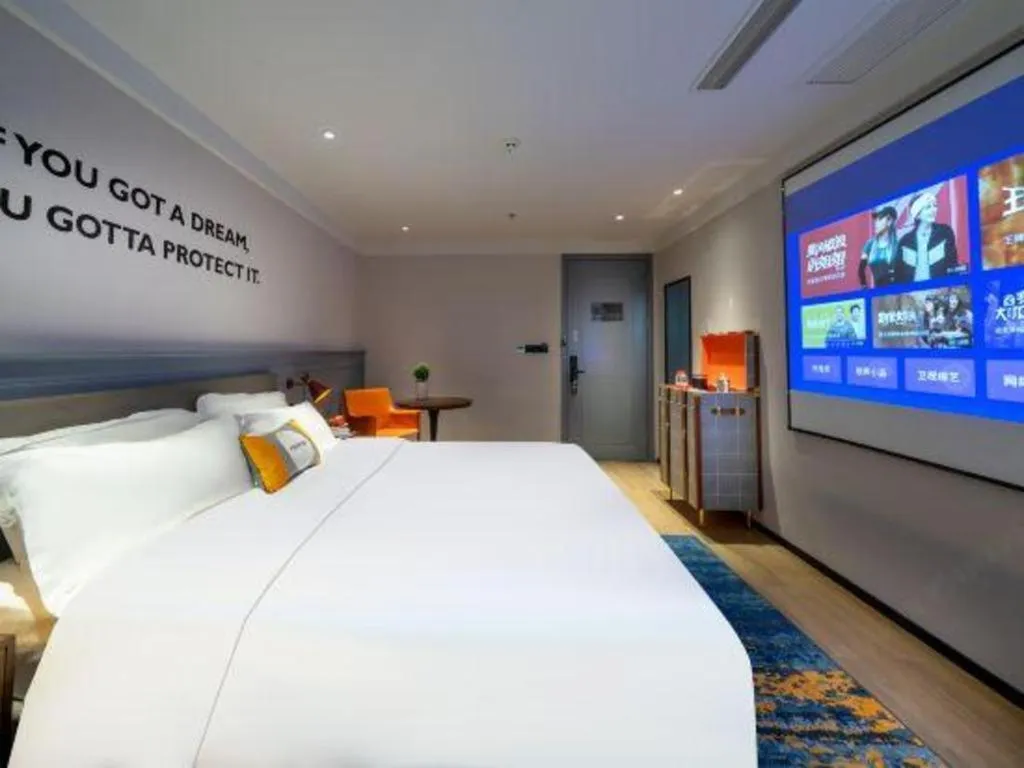 Bed in Premier City Comfort Hotel Suizhou Wuyue Plaza