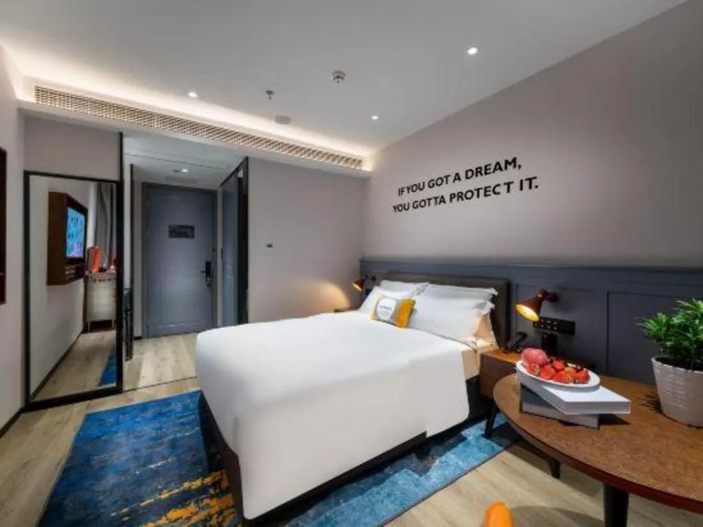 Bed in Premier City Comfort Hotel Suizhou Wuyue Plaza