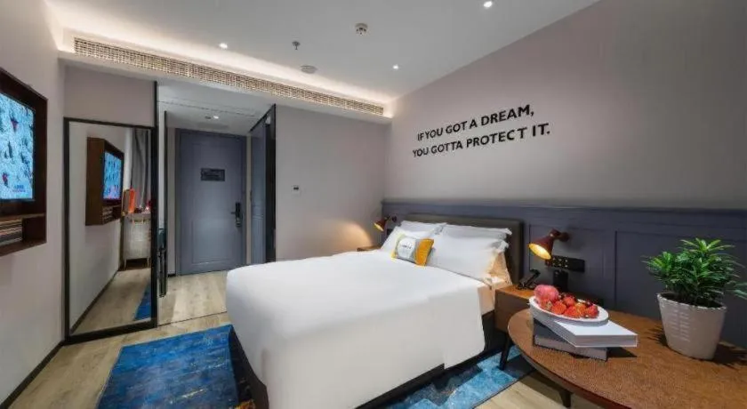 Bed in Premier City Comfort Hotel Suizhou Wuyue Plaza